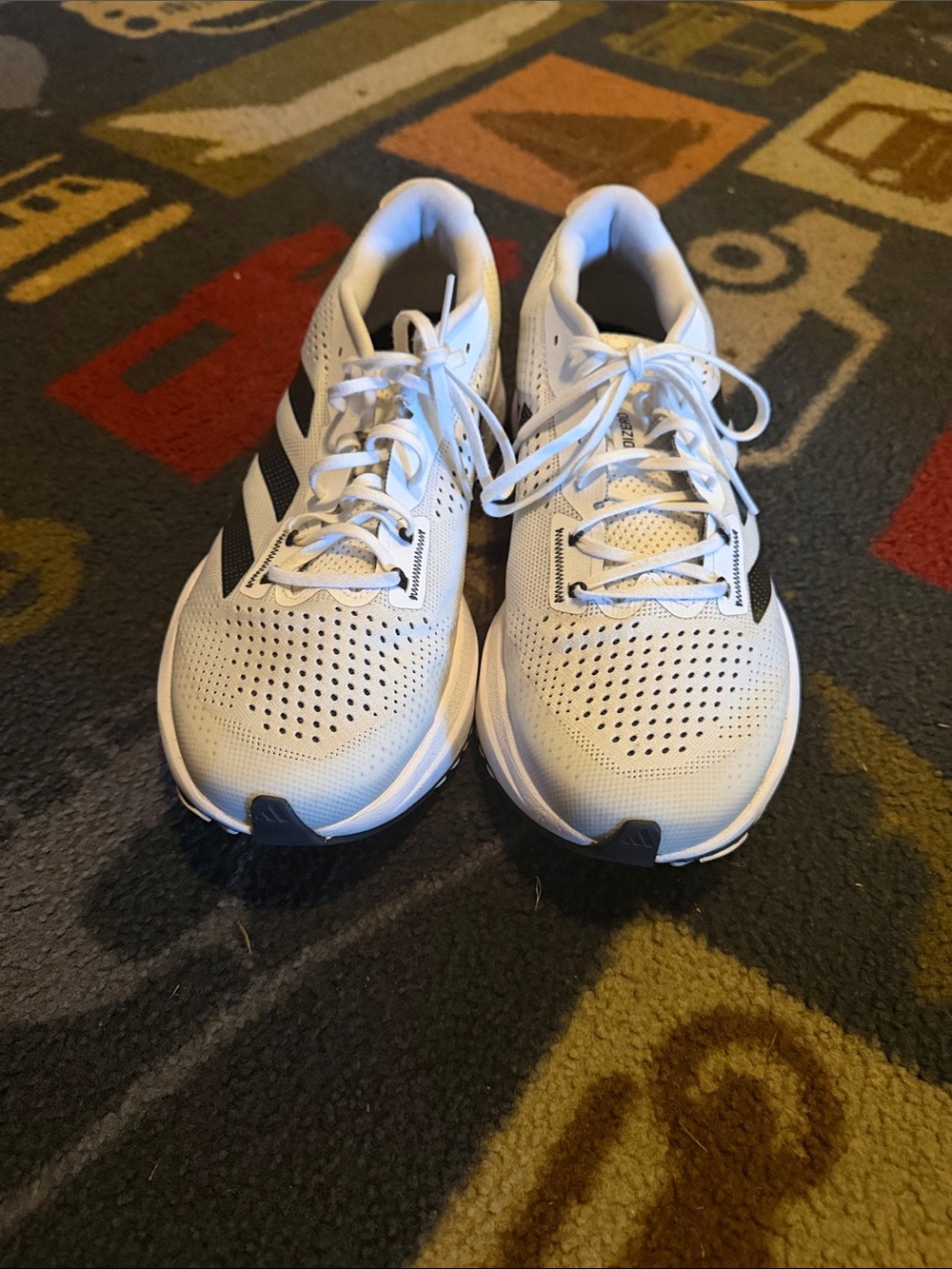 adidas White Athletic Sneakers with Black Stripes